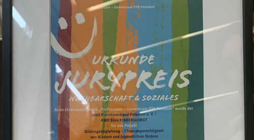 Gerahmte Urkunde für den Jurypreis in der Kategorie Nachbarschaft und Soziales beim Förderwettbewerb Gemeinsam für Potsdam